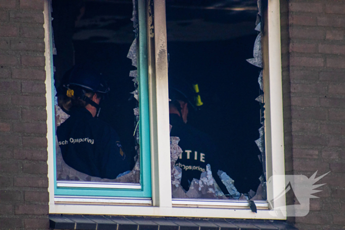 Dode aangetroffen bij woningbrand