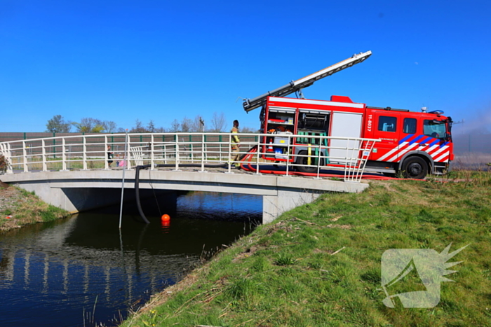 Brand in riet geblust door brandweer