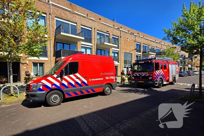 Palletkachel veroorzaakt brandmelding in flatwoning