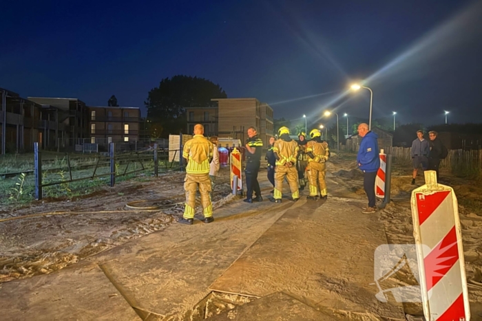 Brand in en naast ondergrondse container