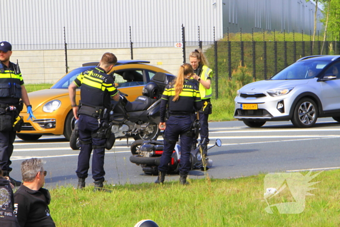 Twee gewonden na botsing met scooter