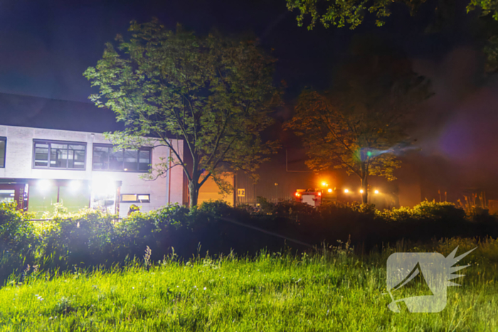 Grote uitslaande brand in loods