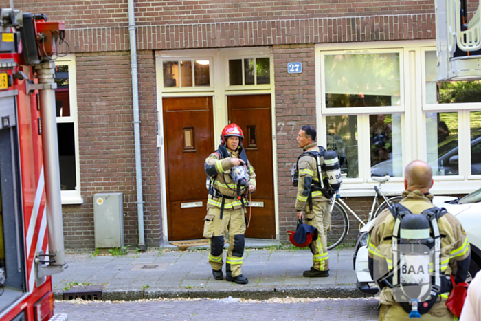 Grote brand in portiekwoning