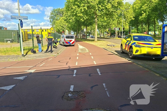 Verkeersongeluk tussen fietser en scooterrijder