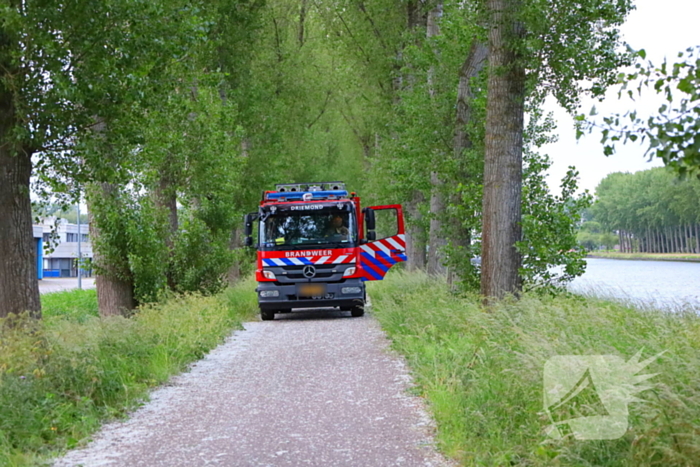 Pakketbezorger belandt in sloot na eenzijdig ongeval