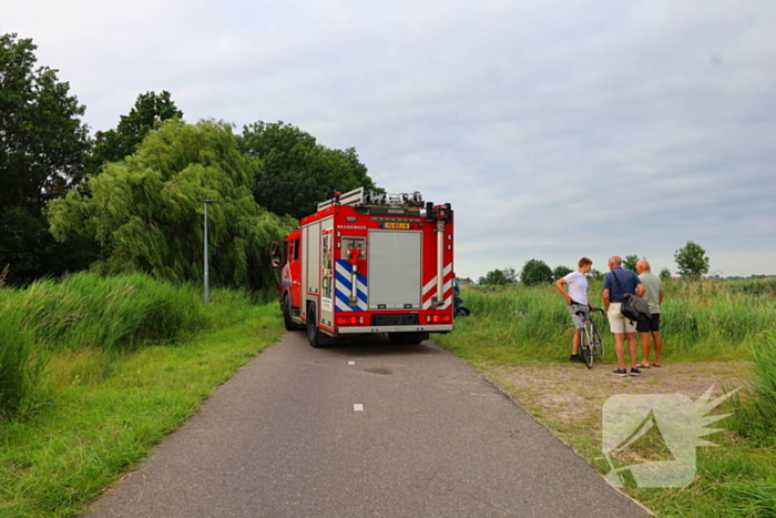 Brand door stoken fikkie bij hooibalen