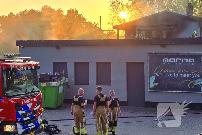 Uitslaande brand in winkelpand