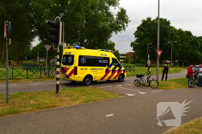 Botsing driewielfiets en auto