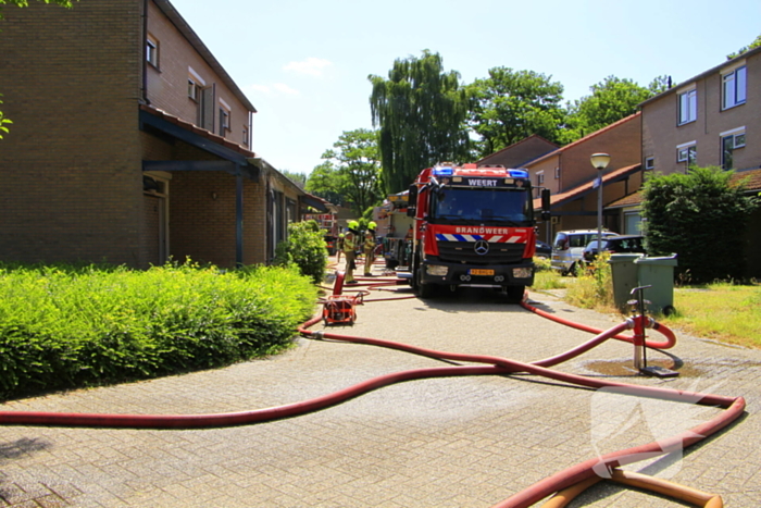 Grote uitslaande brand in woning