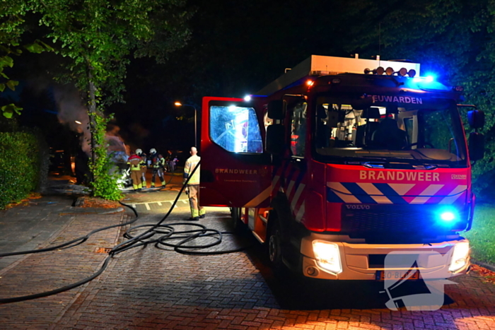 Taxibus volledig in vlammen op