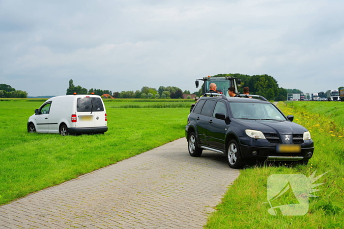 Auto in sloot na ongeluk