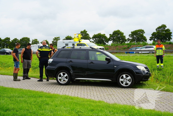 Auto in sloot na ongeluk