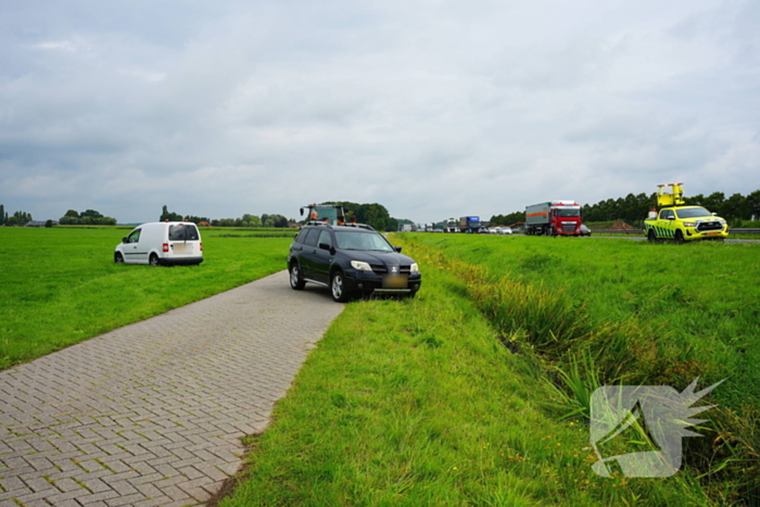 Auto in sloot na ongeluk