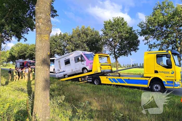 Inzittenden camper stranden door brand