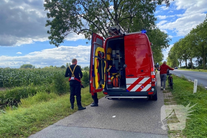 Driewielerbestuurder raakt te water