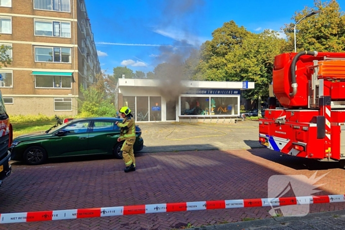 Grote rookontwikkeling door winkelbrand