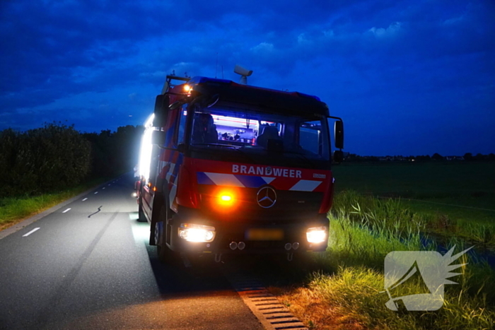 Reddingsactie door brandweer en boer