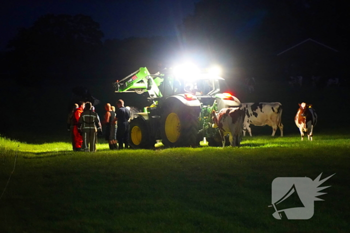 Reddingsactie door brandweer en boer