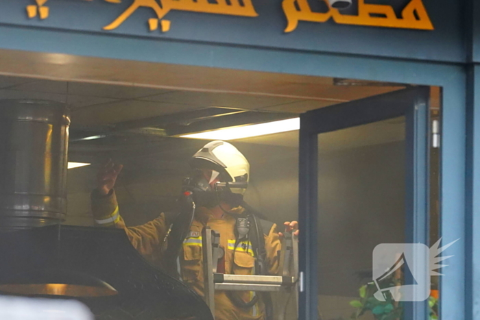 Buitenbrand bij pizzeria onder controle