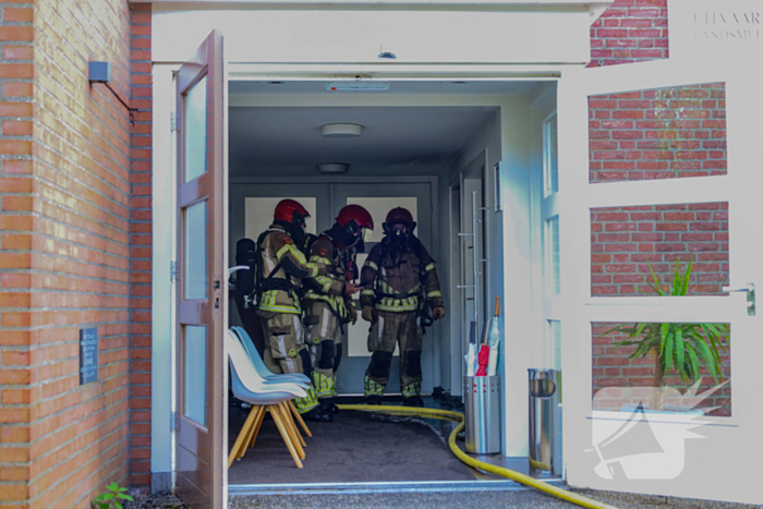 Brand in aula begraafplaats geblust