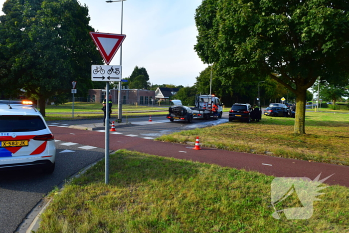 Scooterrijder in botsing op rotonde