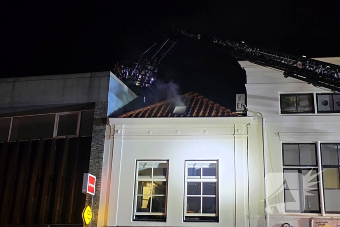 Grote brand boven winkels