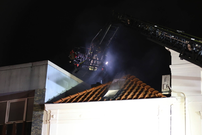 Grote brand boven winkels