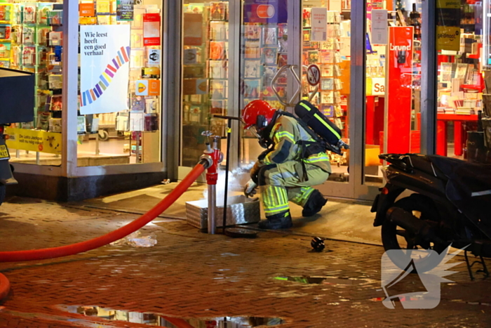 Grote brand boven winkels