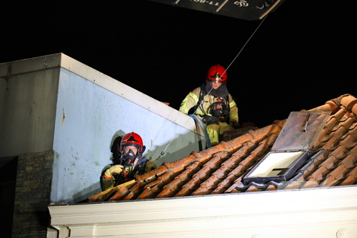 Grote brand boven winkels