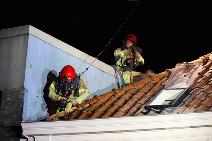 Grote brand boven winkels