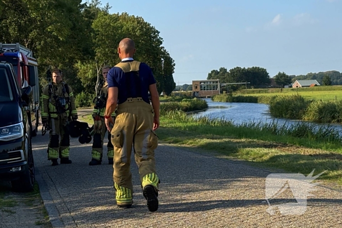 Brandweeractie na ongeval met gaslekkage