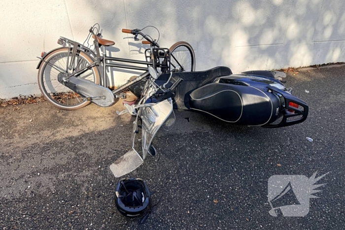 Scooter en fietser botsen in ongeval