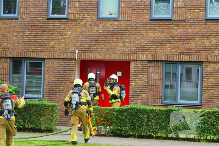 Rookontwikkeling door pan op het vuur