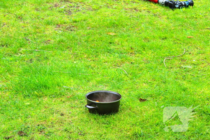 Rookontwikkeling door pan op het vuur