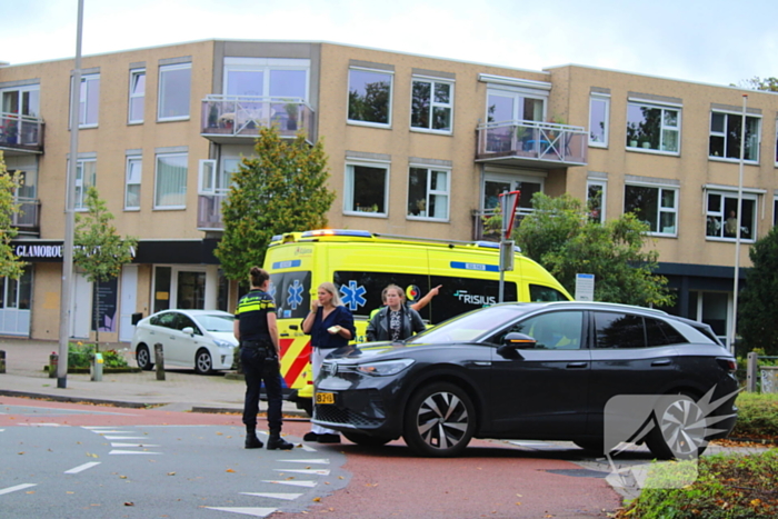 Overstekende scootmobiel aangereden