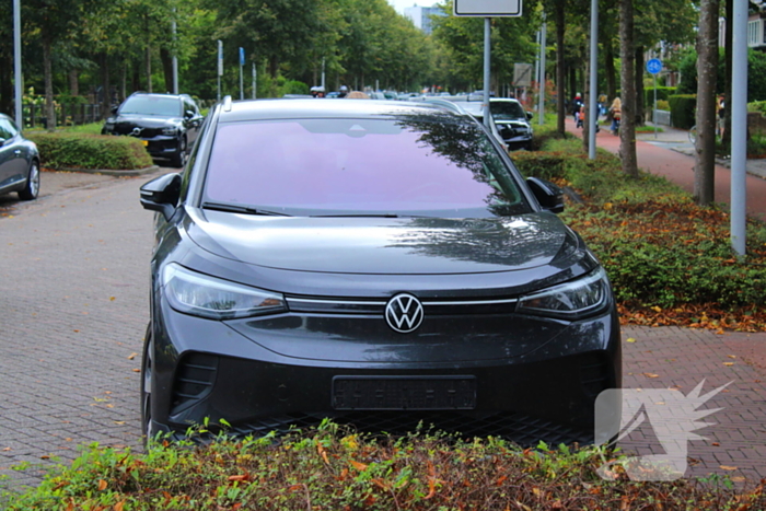 Overstekende scootmobiel aangereden