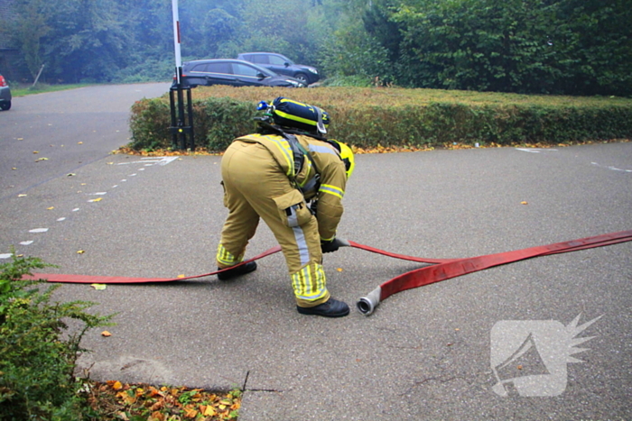 Tuinhuis in vlammen opgegaan