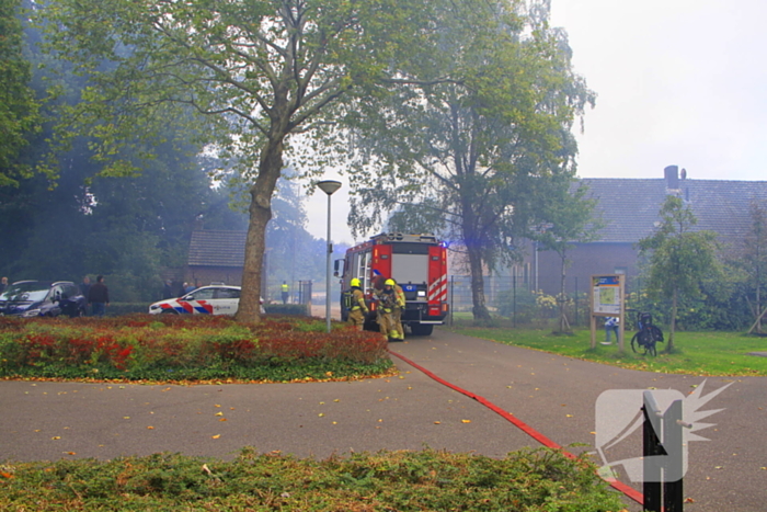 Tuinhuis in vlammen opgegaan
