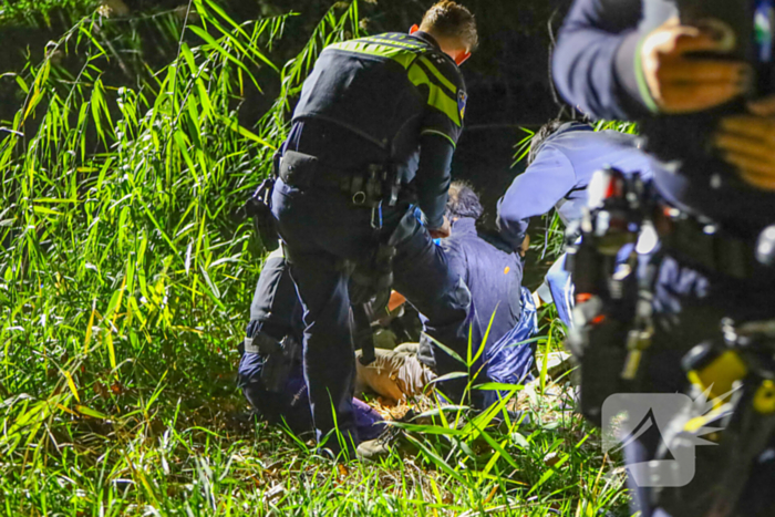 Scootmobiel bestuurder uit water gered