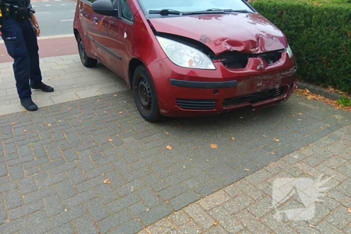 Motor en auto botsen in vrijdagavondverkeer