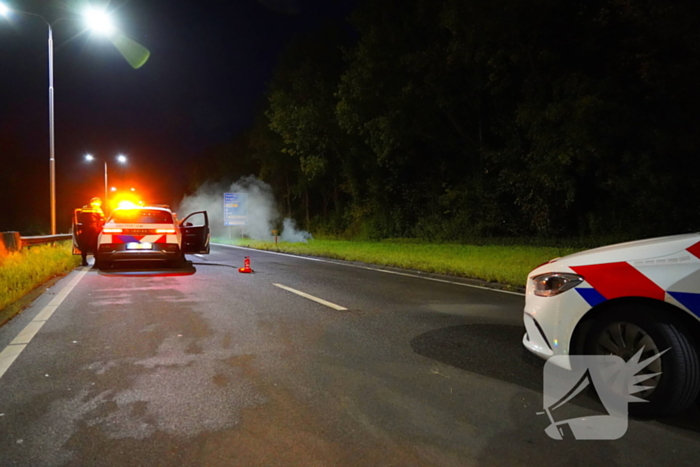 Politie blust brand met behulp van brandweer