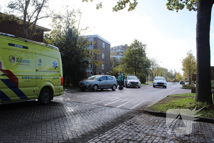 Twee voertuigen raken elkaar bij splitsing