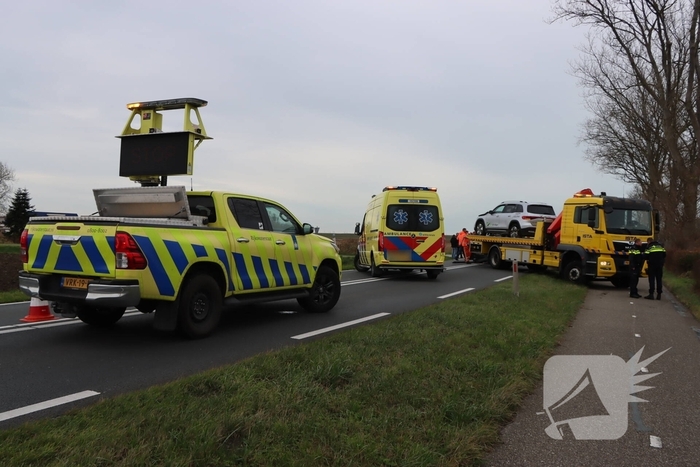 Botsing tussen auto en taxi