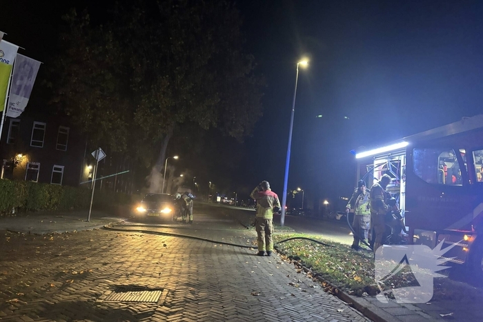 Rookontwikkeling uit geparkeerde auto