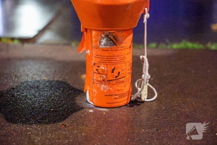 Woningbrand door noodsignaal met oranje rook