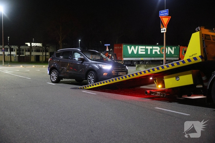 Forse aanrijding op drukke kruising