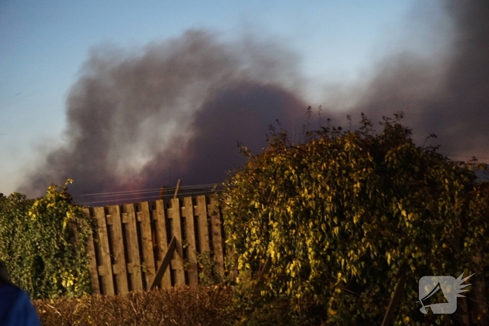 Flinke brand in plastic container bij afvalverwerker