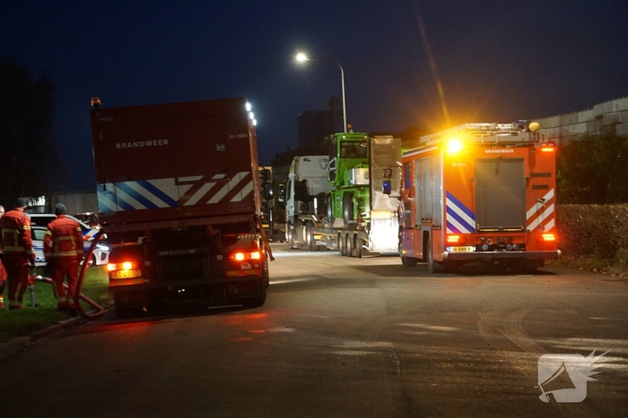 Flinke brand in plastic container bij afvalverwerker