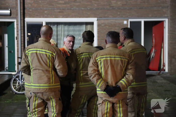 Deur opengebroken bij brand in woning