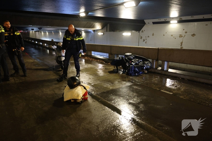 Scooter en scootmobiel botsen op fietspad